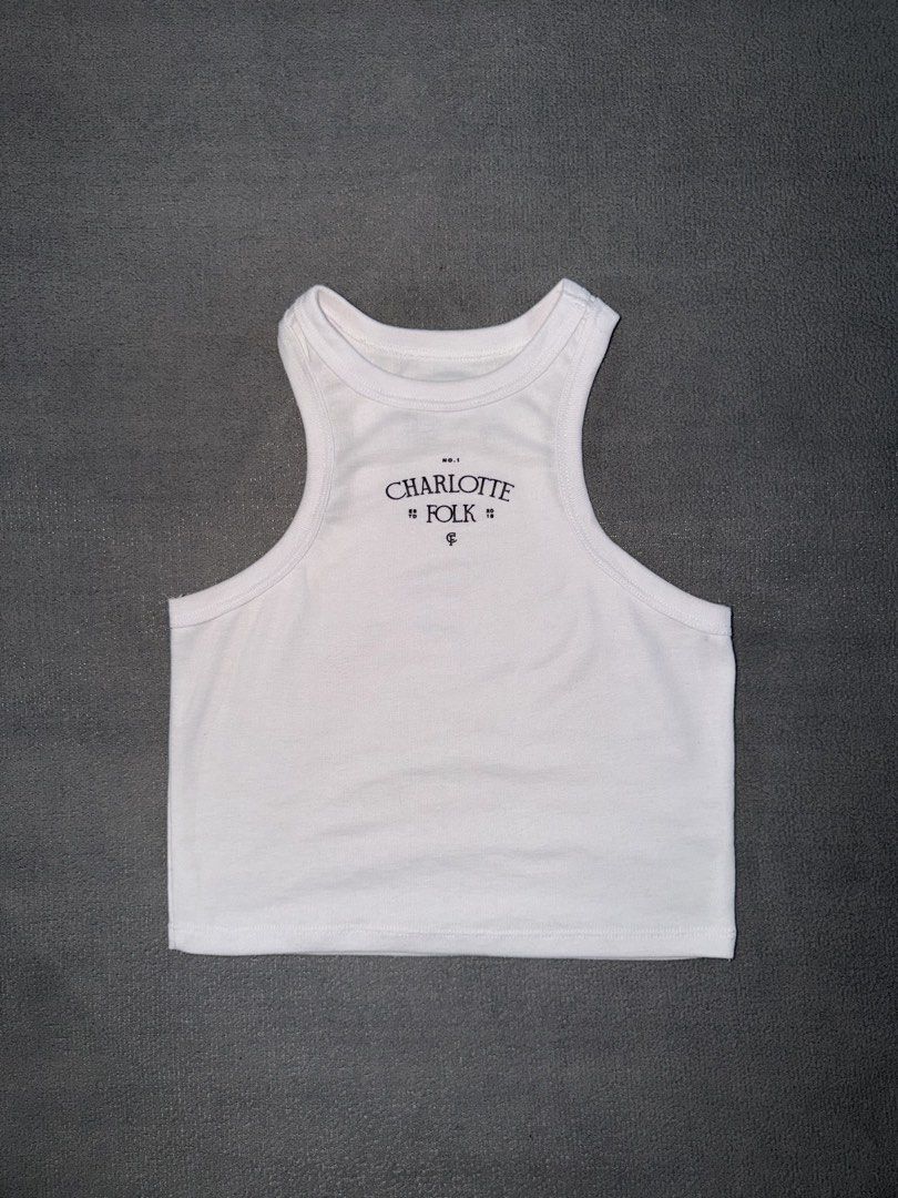 Charlotte Folk White Tank Top (Category: Sleeveless) located in Quezon City. Submitted by spicycalimaki (Listing ID 1460766870, Image 1). Description: - size M - last price posted 🏷️ zara h&m mango uniqlo monki cotton on urban revivo bershka pull & bear love bonito editors market shein tiktok richboyz.