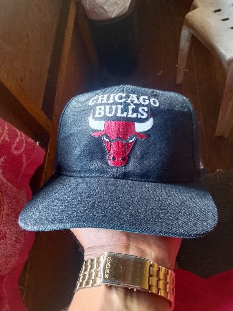 Chicago Bulls NBA Snapback Cap OTTO (Category: Caps & Hats) located in Quezon City. Submitted by theoneshop1 (Listing ID 1460736962, Image 1). Description: - Classic Chicago Bulls snapback cap - Iconic Bulls logo embroidered on the front - NBA logo detail on the side - Adjustable snap closure for a custom fit - Made by OTTO - Ideal for any Chicago Bulls fan.