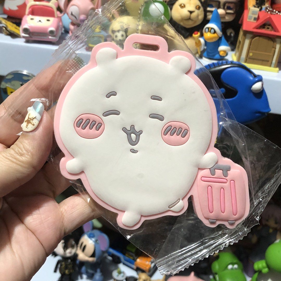 Chiikawa Luggage Bag Tag (Category: Tote Bags) located in Quezon City. Submitted by kitsune.treasures (Listing ID 1460814273, Image 1). Description: *First to pay policy! *1 day reservation only. Failure to pay on time, auto cancel. 📍Quezon City * MOD: J&T | Lalamove * MOP: GCASH | BPI 📦ON HAND AND READY TO SHIP! CONDITION: WHAT YOU SEE IS WHAT YOU GET. Dimensions: Kindly check the photos for the actual measurements. Please check all the photos