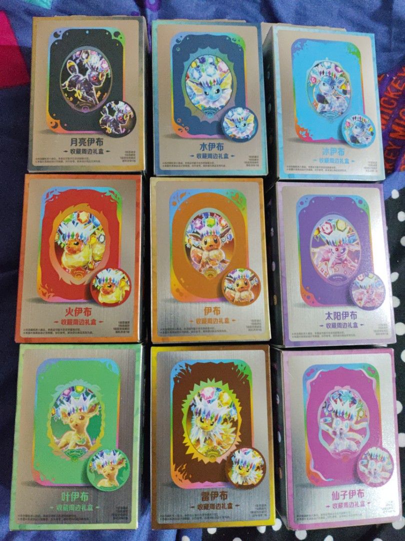 Chinese Pokemon Eeveelution Collection Gift Box (Category: Character Goods) located in Manila. Submitted by wwcollectibles (Listing ID 1460854106, Image 1). Description: Price: Eevee - 1000 Vaporeon - 1000 Flareon - 1000 Jolteon - 1000 Leafeon - 1000 Glaceon - 1000 Espeon - 1000 Sylveon - 1200 Umbreon - 1200.