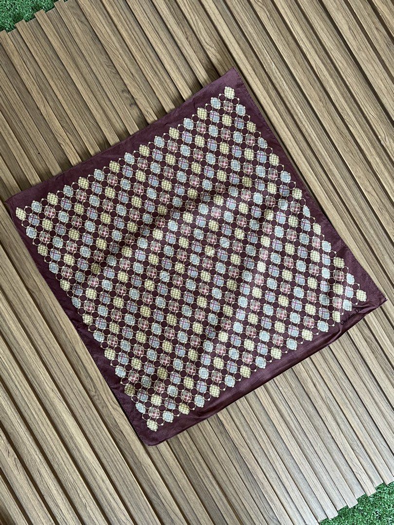 CHRISTIAN DIOR - GEOMETRIC DESIGN HANDKERCHIEF (Category: Scarves) located in Bacolod City. Submitted by timelessbyjosh (Listing ID 1460894324, Image 3). Description: BEST FOR CASUAL OUTFITS SIZE : ACTUAL COLOR : MULTI COLOR COLOR RATE : 9. 5 OUT OF 10 CONDITION : EXCELLENT MATERIAL : MADE IN : FLAWS : NONE DIMENSIONS LENGTH - WIDTH - MEASUREMENT TAKEN WHILE LAYING FLAT..