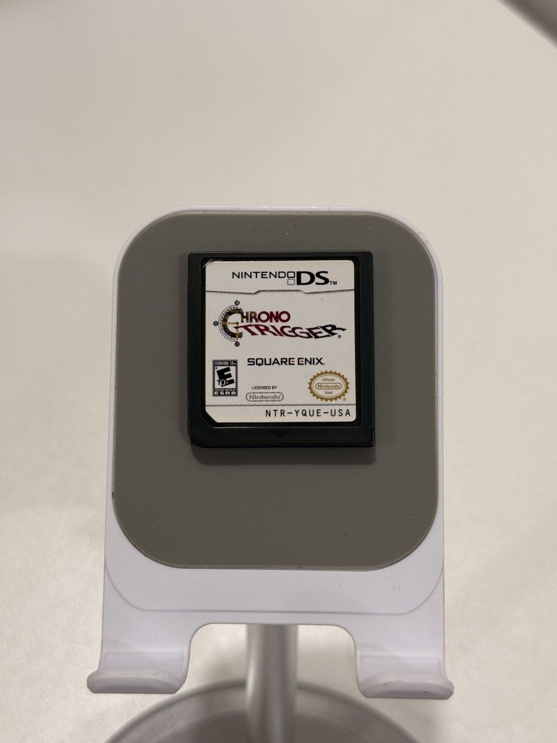 Chrono Trigger DS/2DS/3DS Game (Category: In-Game Products) located in Baliuag. Submitted by mostlyaboutnintendo (Listing ID 1460841435, Image 1). Description: 📌 https://linktr.ee/mostlyaboutnintendo 📢 CARTRIDGE ONLY ✔️ Authentic ✔️ Mabilis ma-read mismong cartridge ✔️ Guaranteed tested and working ✔️ Will always send tested pics before ship out ✔️ Clean Pins ✔️ US Version Chrono Trigger is a legendary RPG featuring an unforgettable time-travel