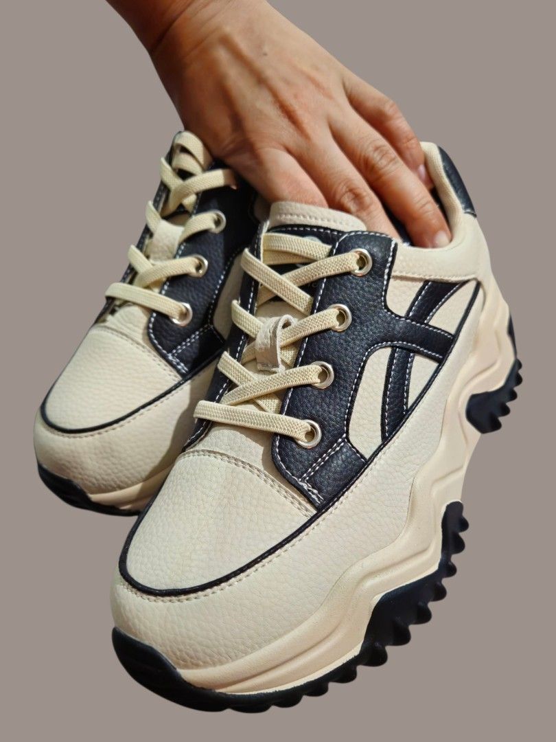 Chunky Sneakers Rubber Shoes (Category: Sneakers) located in Quezon City. Submitted by kirstenbella (Listing ID 1460737656, Image 2). Description: - Multi color black and cream - Comfy wearing - Chunky sole with a unique wavy design - Star detail on back heel - Best fit : size 5-6 - Adds height and stylish - Unique look to any outfit - Brand new No issue at all - Padala for my daughter from Korea.