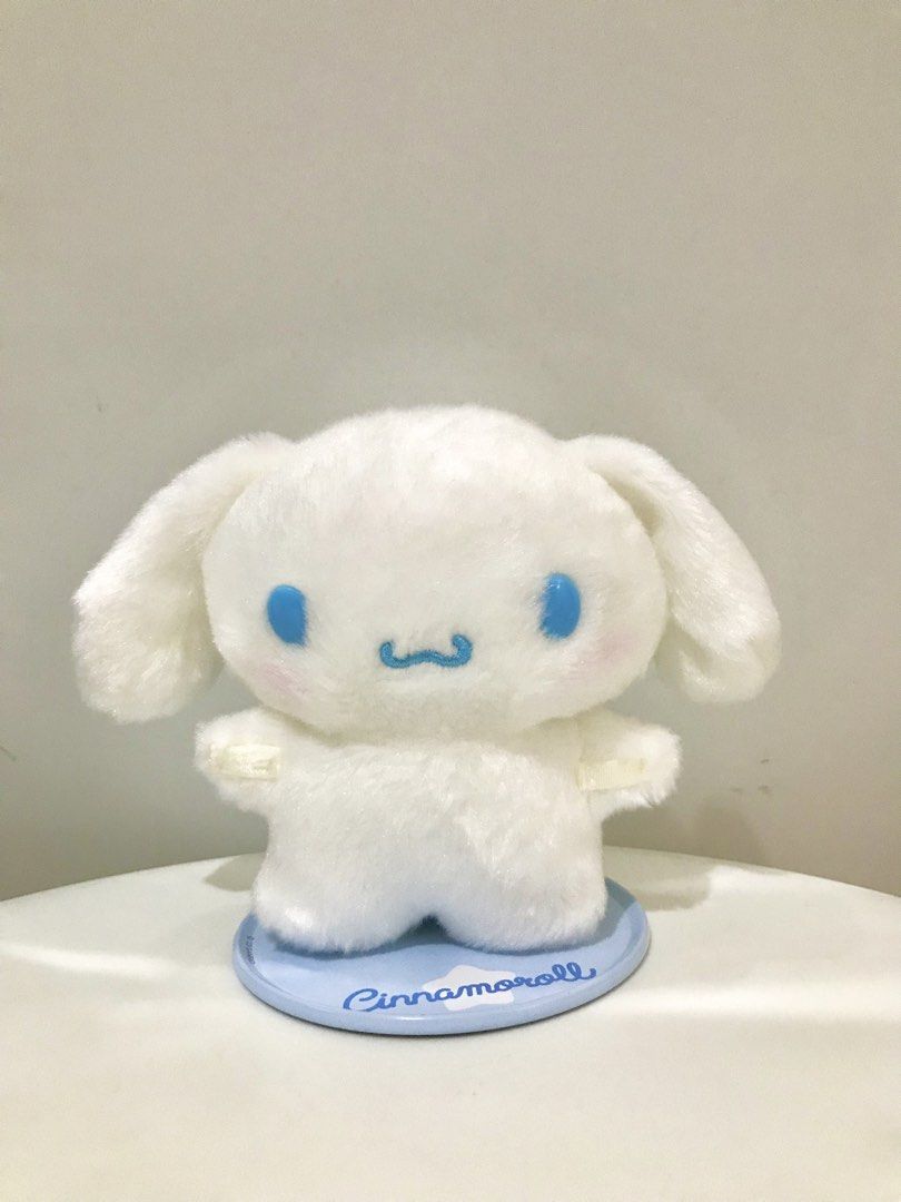 Cinnamoroll Pitatto S (Category: Plushies & Soft Toys) located in Manila. Submitted by hearthearty (Listing ID 1460868450, Image 1). Description: - Adorable Cinnamoroll plush toy - Includes a light blue stand with Cinnamoroll logo - Made from soft and fluffy material - Ideal for Sanrio fans and collectors - Perfect for desk or shelf decoration.