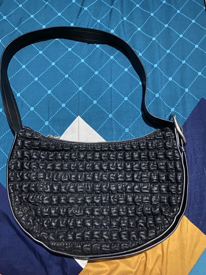 Ck Bag (Category: Luxury Bags & Wallets) located in Bayambang. Submitted by cartier777 (Listing ID 1460786959, Image 2). Description: This is a Calvin Klein Quilted Shoulder Bag (often categorized as a hobo bag or crescent shoulder bag due to its curved shape)..