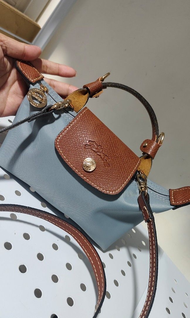 Classic longchmp mini (Category: Cross-body Bags) located in Manila. Submitted by casseyann160760 (Listing ID 1460840696, Image 2). Description: no issue powder blue color.medio dark s photo dhil s ilaw.