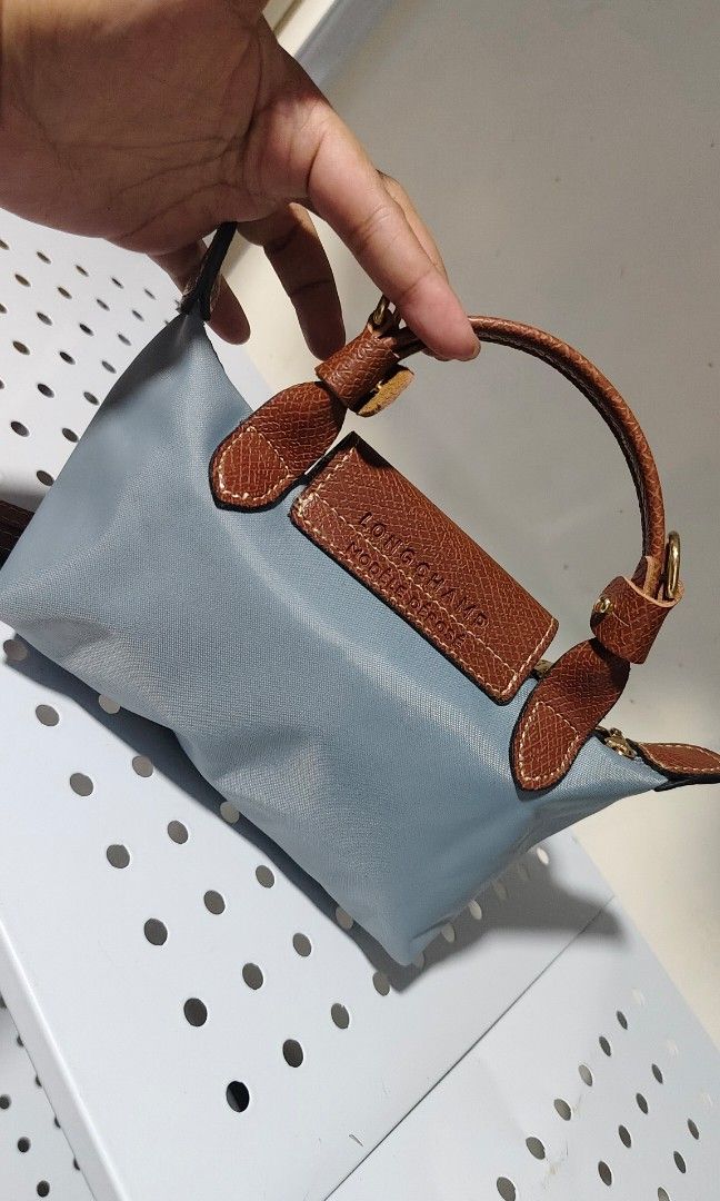 Classic longchmp mini (Category: Cross-body Bags) located in Manila. Submitted by casseyann160760 (Listing ID 1460840696, Image 3). Description: no issue powder blue color.medio dark s photo dhil s ilaw.