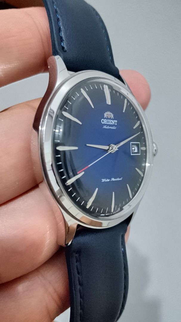 Classic Orient Bambino Version 4 Automatic Dress Watch (Category: Men's Watches) located in Malolos. Submitted by chrono_revival (Listing ID 1460781265, Image 2). Description: PLEASE READ THE FULL POST BEFORE SENDING ANY INQUIRIES. SERIOUS OFFERS ONLY PLEASE. ********** Authentic Orient Bambino V4 Automatic Watch - Sunburst blue dial - All original, will also include the original strap, as seen on the last photo - Case size: approx. 42mm - Condit