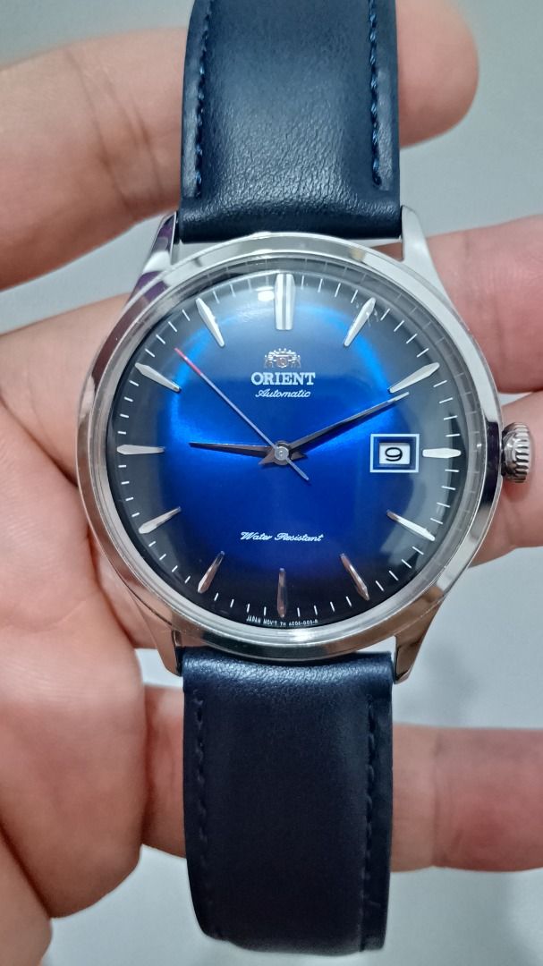 Classic Orient Bambino Version 4 Automatic Dress Watch (Category: Men's Watches) located in Malolos. Submitted by chrono_revival (Listing ID 1460781265, Image 1). Description: PLEASE READ THE FULL POST BEFORE SENDING ANY INQUIRIES. SERIOUS OFFERS ONLY PLEASE. ********** Authentic Orient Bambino V4 Automatic Watch - Sunburst blue dial - All original, will also include the original strap, as seen on the last photo - Case size: approx. 42mm - Condit