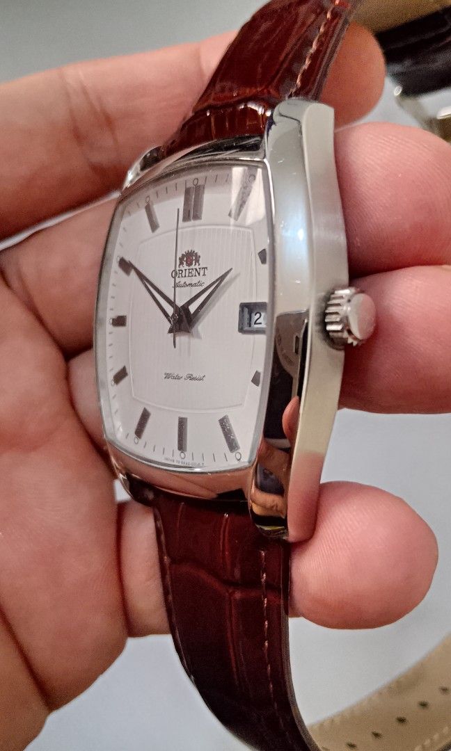 Classic Orient Tonneau Automatic Watch (Category: Men's Watches) located in Malolos. Submitted by chrono_revival (Listing ID 1460782509, Image 3). Description: PLEASE READ THE FULL POST BEFORE SENDING ANY INQUIRIES. SERIOUS OFFERS ONLY PLEASE. ********** Authentic Orient Classic Tonneau Automatic Watch - Crisp white dial - All original, will also include the original strap - Case size: approx. 41x43mm - Lug size: approx. 22mm - Condition: 9/10 - 