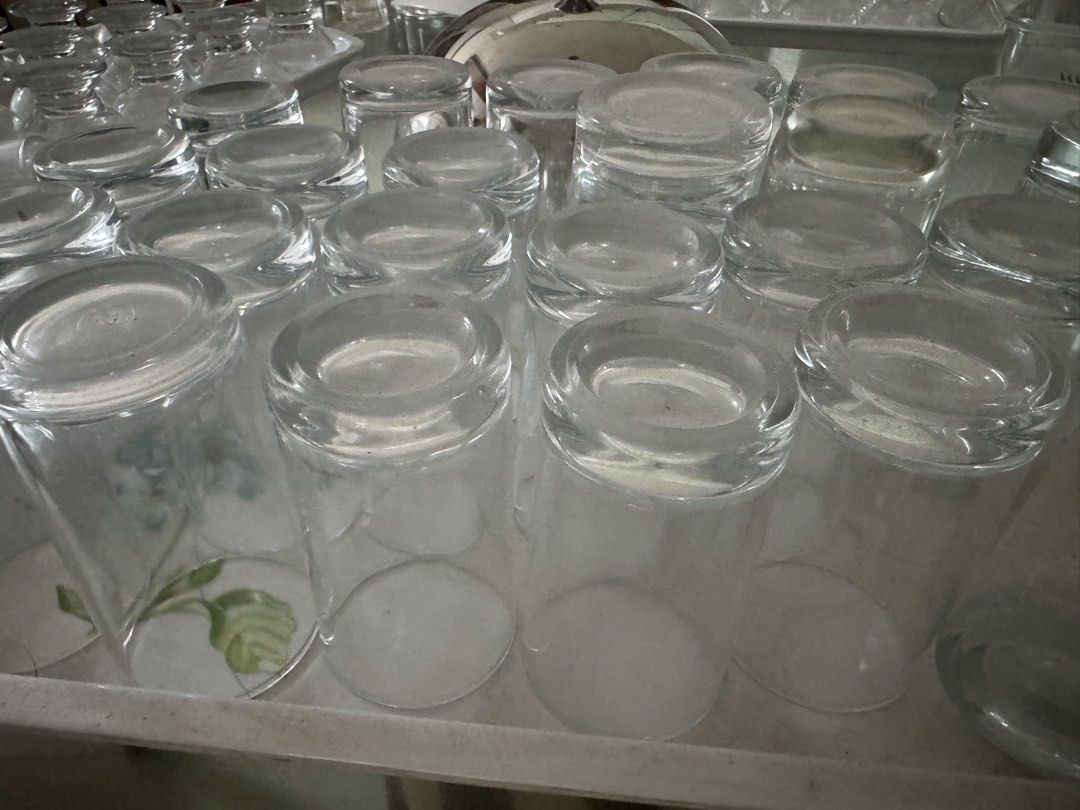 Clear Drinking Glasses SOLD EACH (Category: Dinnerware & Cutlery) located in Manila. Submitted by decluterthings888 (Listing ID 1460722671, Image 2). Description: - clear drinking glasses - Uniform size and shape - Ideal for everyday use or entertaining guests - Stackable design for convenient storage - Clean and ready for a new home.