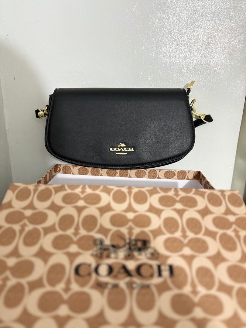 Coach Black Leather Shoulder Bag with Gold Hardware (Category: Luxury Bags & Wallets) located in Abucay. Submitted by erindeclutterss (Listing ID 1460816969, Image 2). Description: • 2-way bag, can be worn as a shoulder bag or sling bag. with free strap included. • with Box and Dust Bag •rfs already got the same bag but in different color •nego!! .