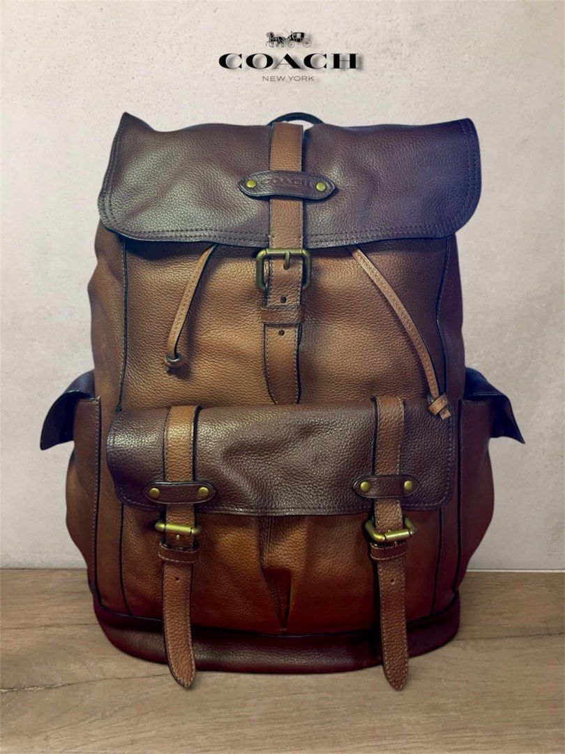 Coach Brown Leather Backpack (UNISEX) (Category: Backpacks) located in Cebu City. Submitted by gabgaaab (Listing ID 1460758953, Image 3). Description: - Coach Hudson Backpack Leather - Excellent Condition - Color: Two-tone saddle brown and dark mahogany -‘Closure: Flap cover with buckle strap and drawstring top - Main compartment with zip and slip pockets - Origin: Made in Vietnam - Actual pics posted .