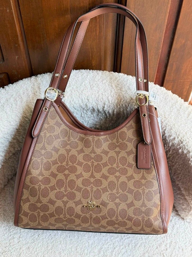 Coach Erin Shoulder Bag (Category: Shoulder Bags) located in Manila. Submitted by msddirectfactoryoutlet (Listing ID 1460360196, Image 1). Description: Erin Shoulder Bag L: 12.25" H: 10.25" W: 5.5" US Grade 100%.