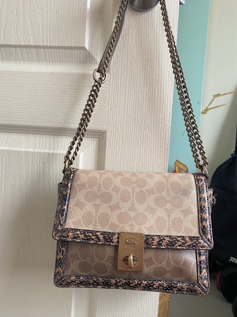 Coach Hutton Snakeskin (Category: Luxury Bags & Wallets) located in Cebu City. Submitted by quing1993 (Listing ID 1460765459, Image 1). Description: Authetnic Coach Hutton Snake Skin 2 way medium size 4 compartments With hangtag Ykk zipper Gold tone hardwares With signs of used sa chain pero di halata. You are buying pre-loved piece so expect signs of wear. Please inspect pictures and ask questions to avoid buyer's remorse. No return and no excha