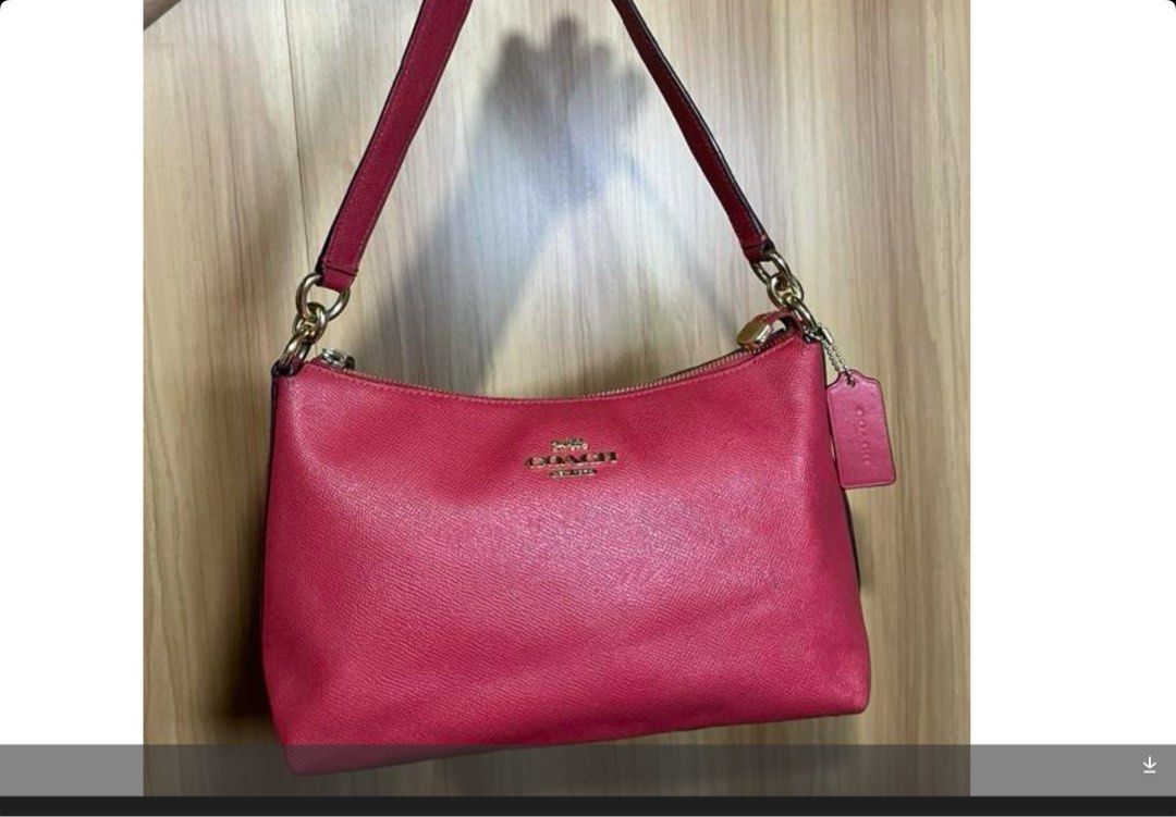Authentic Coach Lewis Red Shoulder Bag (Category: Luxury Bags & Wallets) located in Malolos. Submitted by keithkat11 (Listing ID 1460887359, Image 2). Description: Authentic Coach Lewis Red in Crossgrain leather -in good condition, signs of usage only Rfs: decluttering, buying a newer bag.