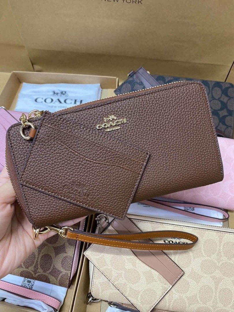 Coach Long Wallet 2in1 (Category: Wallets & Card holders) located in Quezon City. Submitted by bagsboutiqueph (Listing ID 1460748609, Image 2). Description: LAST PRICE POSTED. LIMITED STOCKS! BRANDNEW WITH INCLUSIONS. COLOR MAY SLIGHTLY VARY IN ACTUAL DUE TO LIGHTING AND CAMERA SETTING. OTHER PHOTOS WILL BE SEND DURING PURCHASE AND FOR SURE BUYERS ONLY. WHEN IN DOUBT, DO NOT ORDER. THANK YOU..