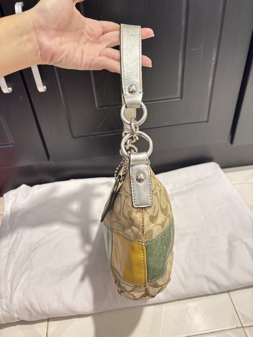 Coach Patchwork kili Bag (Category: Shoulder Bags) located in Lapu Lapu. Submitted by affordmo (Listing ID 1460848688, Image 3). Description: - Authentic Coach shoulder bag - Beige monogram canvas with colorful patchwork accents - Silver hardware - Leather strap - Zipper closure - Great for everyday use.