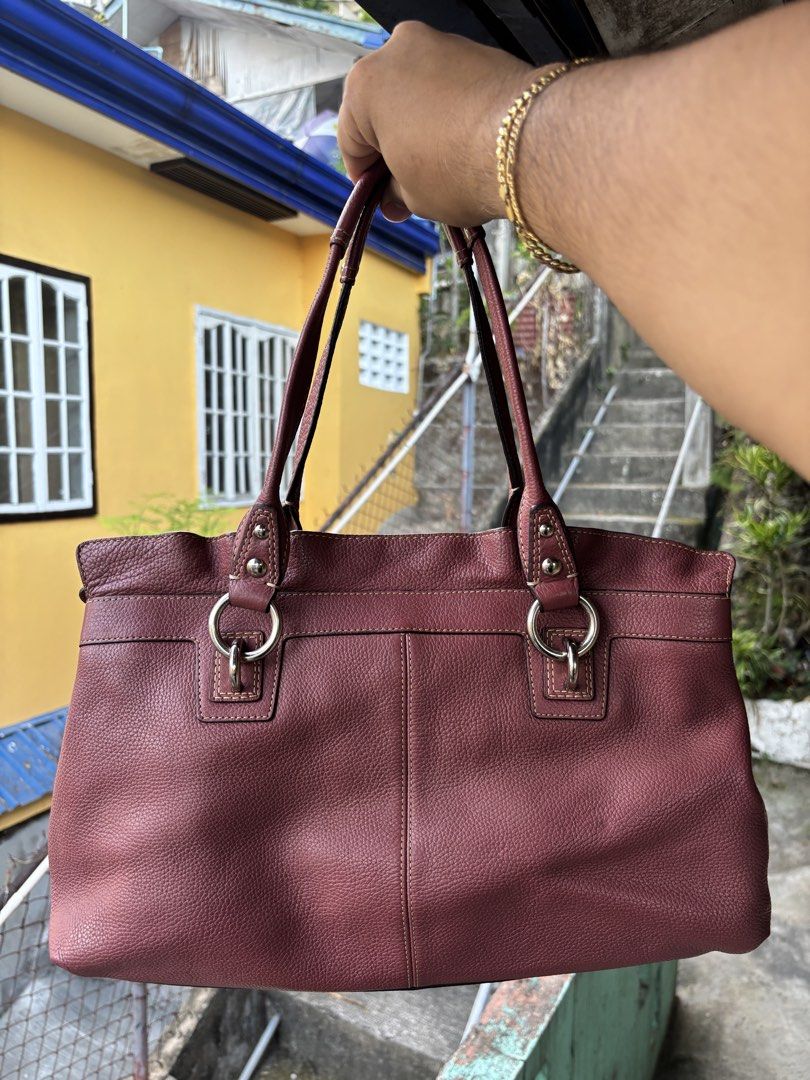 Coach Penelope Pebbled Leather Shoulder Bag (Category: Shoulder Bags) located in Cebu City. Submitted by jhon32closetfinds (Listing ID 1460917149, Image 2). Description: This appears to be a Coach Penelope Pebbled Leather Shoulder Bag in a soft mauve pink, accented by distinct silver-tone hardware on the dual shoulder straps.
