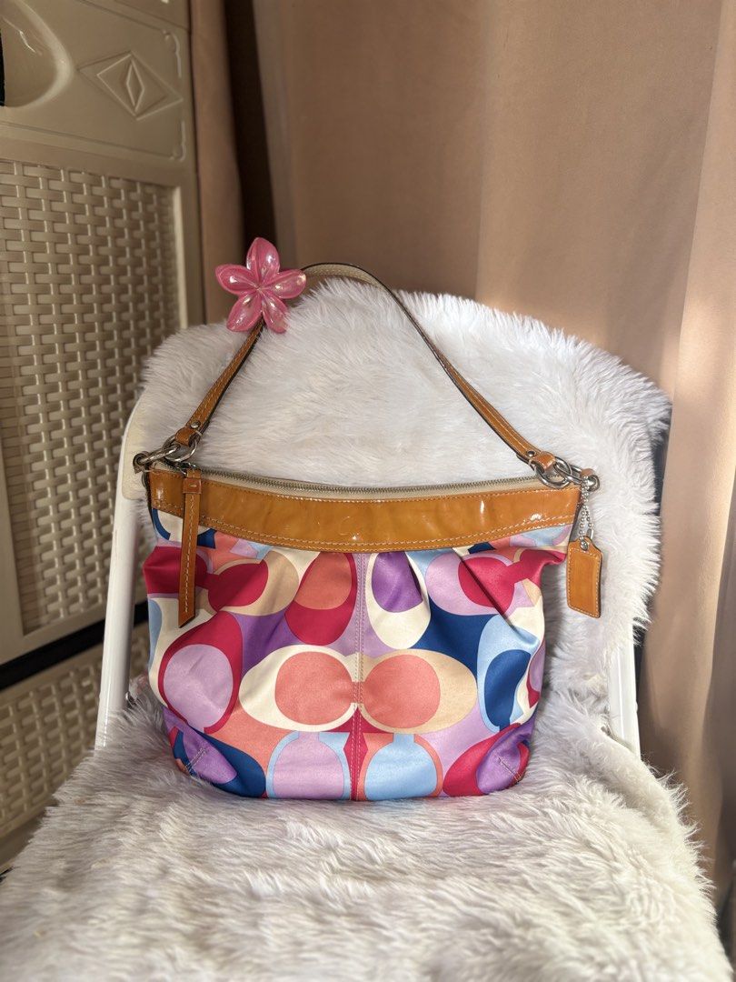 Coach Rare Multi Color scarf print (Category: Luxury Bags & Wallets) located in Manila. Submitted by by.leia (Listing ID 1460823724, Image 1). Description: FOR SALE Coach Multi Color Scarf print Hobo bag -Rare -Original/ Authentic -No issue 📍Novaliches Qc.
