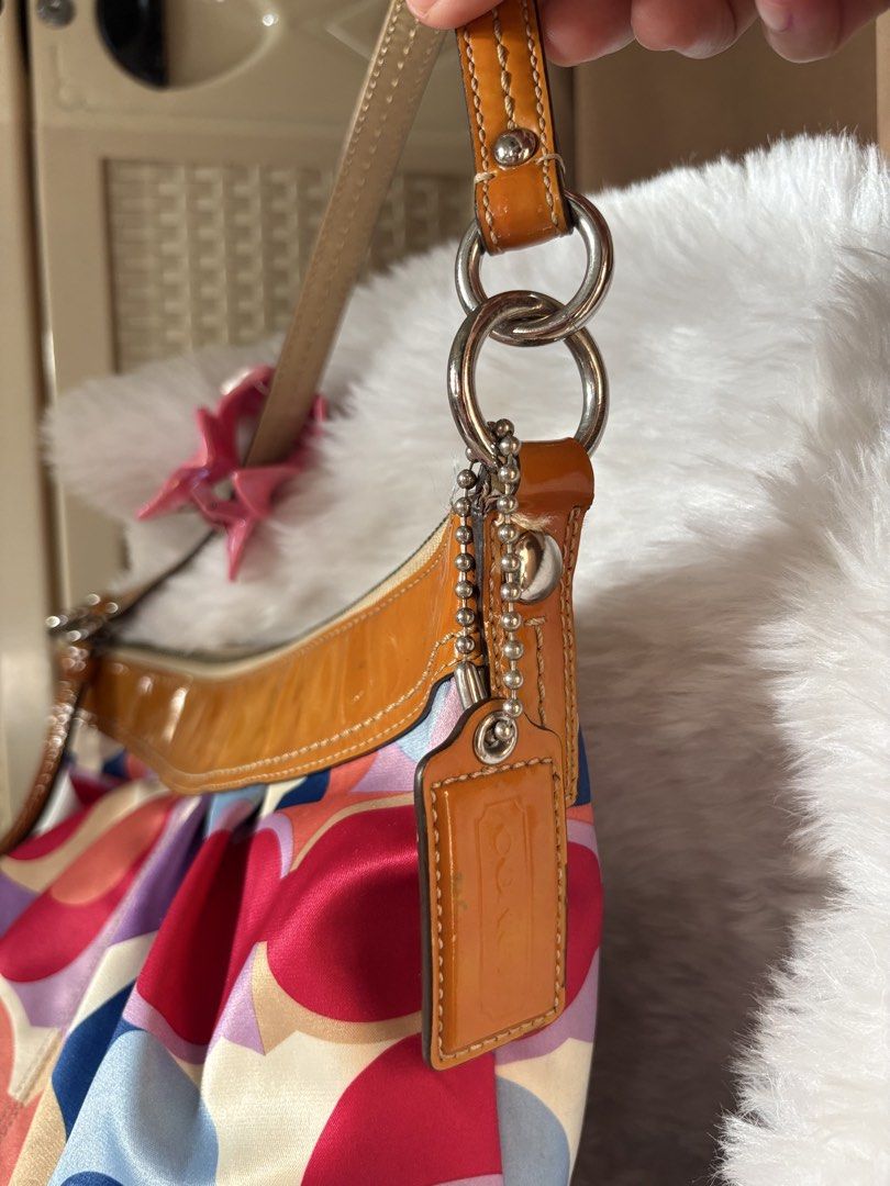Coach Rare Multi Color scarf print (Category: Luxury Bags & Wallets) located in Manila. Submitted by by.leia (Listing ID 1460823724, Image 2). Description: FOR SALE Coach Multi Color Scarf print Hobo bag -Rare -Original/ Authentic -No issue 📍Novaliches Qc.