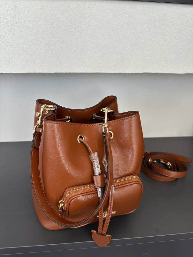 Coach Rowan Bucket Pocket (Category: Cross-body Bags) located in Quezon City. Submitted by bagsboutiqueph (Listing ID 1460870004, Image 3). Description: LAST PRICE POSTED. LIMITED STOCKS! BRANDNEW WITH INCLUSIONS. COLOR MAY SLIGHTLY VARY IN ACTUAL DUE TO LIGHTING AND CAMERA SETTING. OTHER PHOTOS WILL BE SEND DURING PURCHASE AND FOR SURE BUYERS ONLY. WHEN IN DOUBT, DO NOT ORDER. THANK YOU..