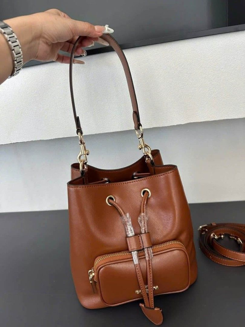Coach Rowan Bucket Pocket (Category: Cross-body Bags) located in Quezon City. Submitted by bagsboutiqueph (Listing ID 1460870004, Image 2). Description: LAST PRICE POSTED. LIMITED STOCKS! BRANDNEW WITH INCLUSIONS. COLOR MAY SLIGHTLY VARY IN ACTUAL DUE TO LIGHTING AND CAMERA SETTING. OTHER PHOTOS WILL BE SEND DURING PURCHASE AND FOR SURE BUYERS ONLY. WHEN IN DOUBT, DO NOT ORDER. THANK YOU..