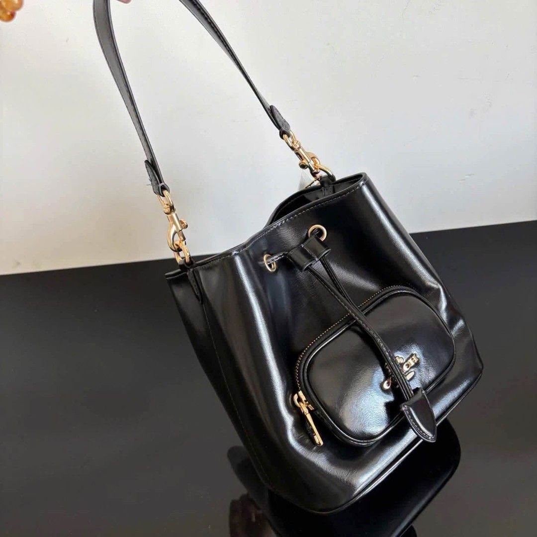 Coach Rowan Bucket Pocket in Black (Category: Cross-body Bags) located in Quezon City. Submitted by bagsboutiqueph (Listing ID 1460870249, Image 3). Description: LAST PRICE POSTED. LIMITED STOCKS! BRANDNEW WITH INCLUSIONS. COLOR MAY SLIGHTLY VARY IN ACTUAL DUE TO LIGHTING AND CAMERA SETTING. OTHER PHOTOS WILL BE SEND DURING PURCHASE AND FOR SURE BUYERS ONLY. WHEN IN DOUBT, DO NOT ORDER. THANK YOU..