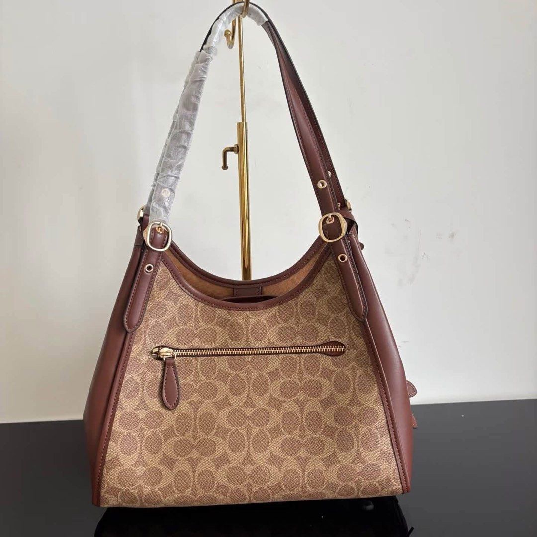 Coach Shoulder Bag (Category: Shoulder Bags) located in Manila. Submitted by bagsandmanymanymore1 (Listing ID 1460822730, Image 3). Description: Coach Shoulder Bag Actual photos posted Paperbag, dustbag and carecard Please read before you order 👉🏻❗️Payment first before shipping ❗️Cut off time of payment 11am sameday delivery ❗️NO MEET UP / NO PICK UP ❗️ORDER CANNOT BE CANCELLED ❗️PLEASE DON’T BUY IF YOU ARE IN DOUBT ❗️NO RETURN! NO REFUND! ❗️NO