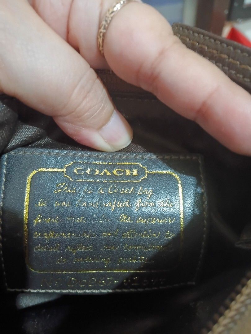 Coach Signature C Monogram Sling Bag (Category: Luxury Bags & Wallets) located in Cavite. Submitted by ms.de.clutter (Listing ID 1460791389, Image 3). Description: - Authentic Coach shoulder bag - Classic Signature C monogram pattern - Brown and black colorway - Genuine leather trim and strap - Polished brass hardware - Secure zipper closure - Interior "Coach" and "Est. 1941" tag - Ideal for daily use.