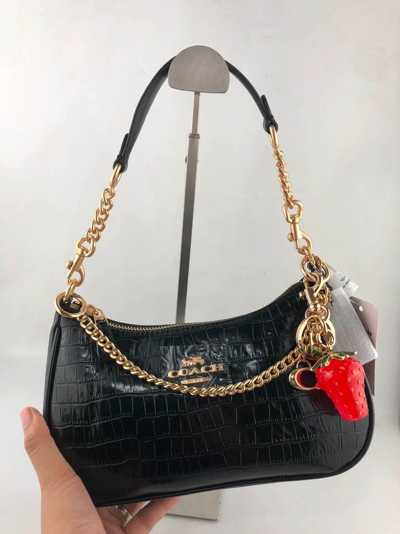 Coach Teri Shoulder Bag with Charms (Category: Shoulder Bags) located in Quezon City. Submitted by bagsboutiqueph (Listing ID 1460874675, Image 1). Description: LAST PRICE POSTED. LIMITED STOCKS! BRANDNEW WITH INCLUSIONS. COLOR MAY SLIGHTLY VARY IN ACTUAL DUE TO LIGHTING AND CAMERA SETTING. OTHER PHOTOS WILL BE SEND DURING PURCHASE AND FOR SURE BUYERS ONLY. WHEN IN DOUBT, DO NOT ORDER. THANK YOU..