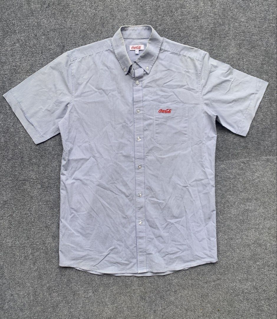 Coca-Cola Polo (Category: Tshirts & Polo Shirts ) located in Marikina City. Submitted by azaero (Listing ID 1460890419, Image 2). Description: W 19 x L 28 Color rate 8/10 Minor yellowish on neckline .
