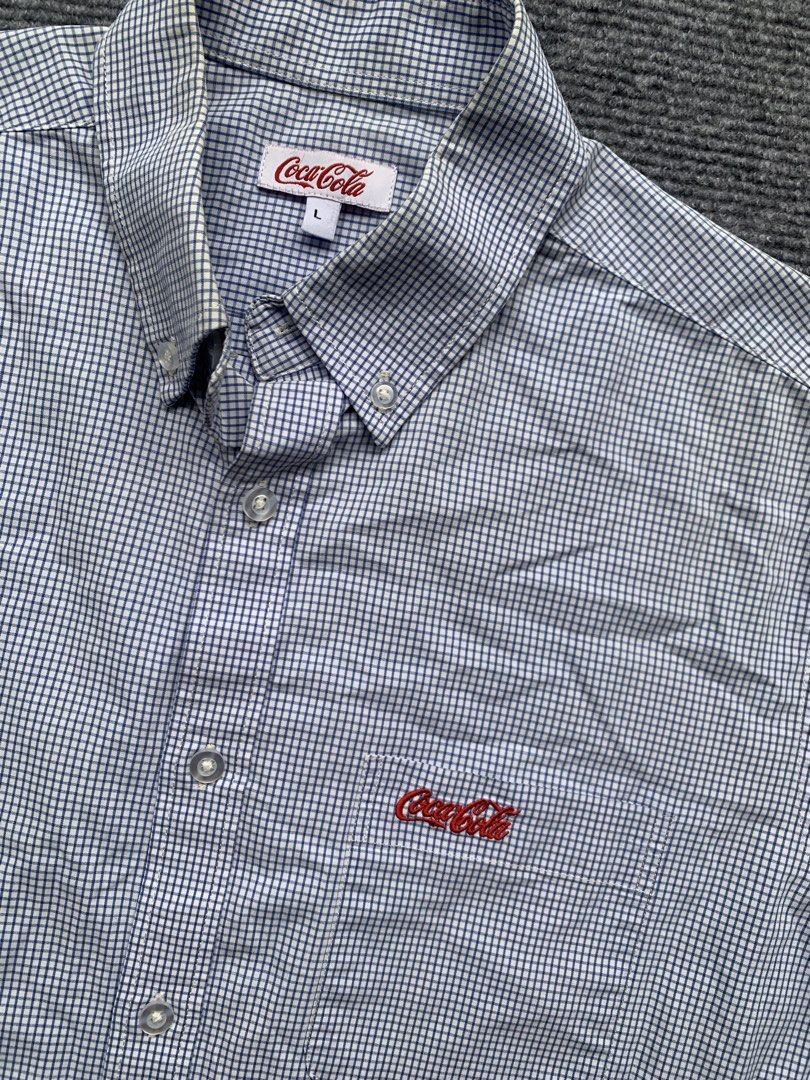 Coca-Cola Polo (Category: Tshirts & Polo Shirts ) located in Marikina City. Submitted by azaero (Listing ID 1460890419, Image 3). Description: W 19 x L 28 Color rate 8/10 Minor yellowish on neckline .