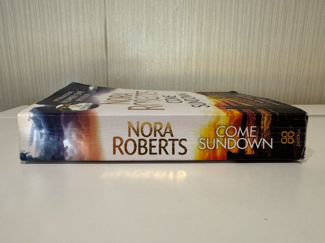 Come Sundown by Nora Roberts (Romance/Suspense) - Paperback (Category: Storybooks) located in Quezon City. Submitted by pinkc0conut (Listing ID 1460762894, Image 3). Description: Come Sundown - Authentic Copy - Flaws: spine creases, front cover is slightly faded, cover is peeling on the edges - Mode of Payment: GCash, payment first.