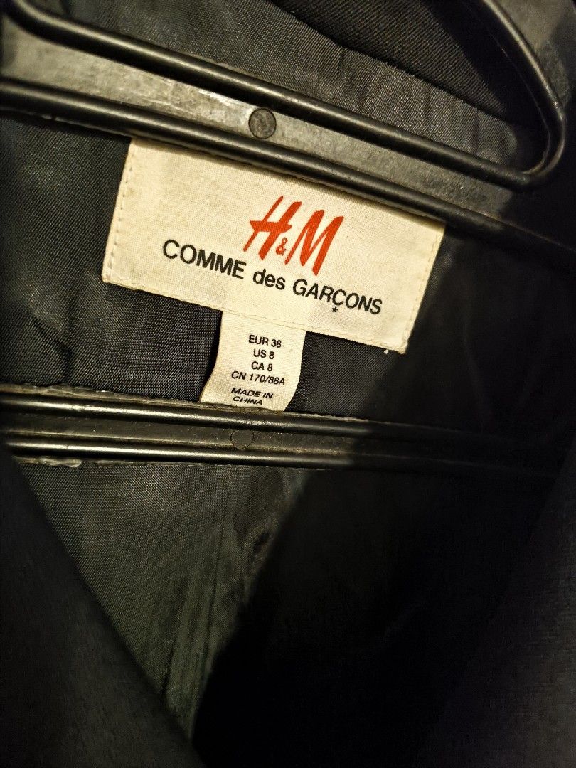 COMME des GARCONS x H&M Three-Button Tailored Jacket, Black, US size 8 (Category: Coats, Jackets and Outerwear) located in Baguio. Submitted by alk08 (Listing ID 1460903566, Image 2). Description: vintage Comme des Garçons x H&M Black Blazer, released during their highly coveted 2008 Autumn collaboration. Because this piece is a rare archival designer collaboration, it is no longer sold in standard retail stores..