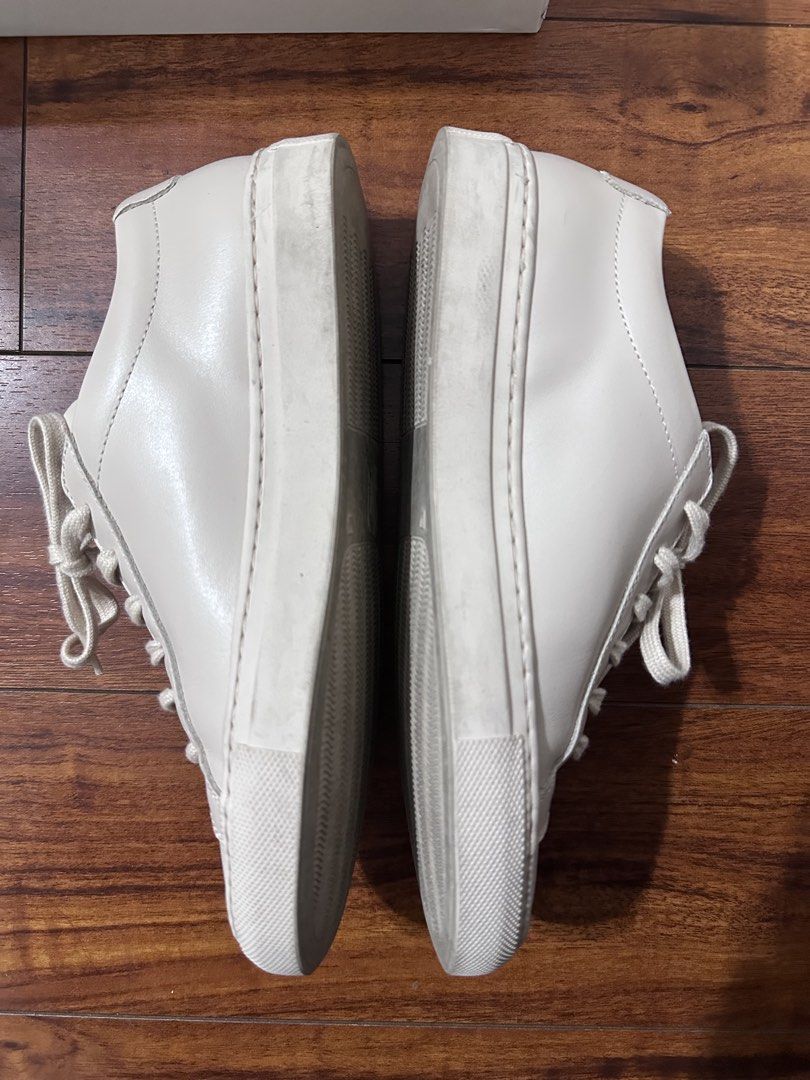 Common Projects Woman Achilles Low Sneakers (Category: Sneakers) located in Quezon City. Submitted by kris_16171 (Listing ID 1460742491, Image 3). Description: - Authentic Common Projects Achilles Low sneakers - Made in Italy - Premium leather upper - Durable rubber sole - Comes with original box - Includes extra laces and dust bag - has some creasing on the inside No longer fits after pregnancy Nude colour size 35.