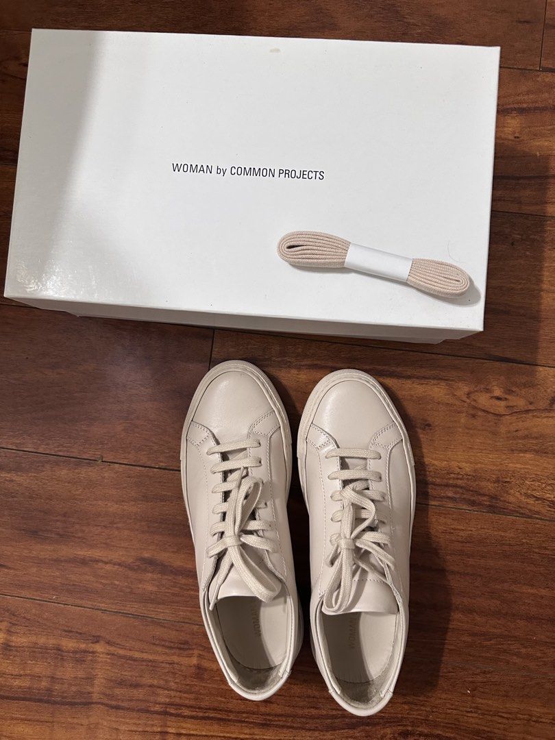 Common Projects Woman Achilles Low Sneakers (Category: Sneakers) located in Quezon City. Submitted by kris_16171 (Listing ID 1460742491, Image 1). Description: - Authentic Common Projects Achilles Low sneakers - Made in Italy - Premium leather upper - Durable rubber sole - Comes with original box - Includes extra laces and dust bag - has some creasing on the inside No longer fits after pregnancy Nude colour size 35.
