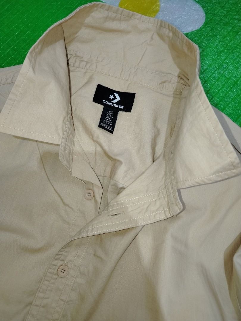 Converse Buttondown (Category: Tshirts & Polo Shirts ) located in Dasmarinas. Submitted by amthriftmixph.2001 (Listing ID 1460730747, Image 2). Description: BRAND: Converse SIZE: Xl DIMES: 23" Width x 27 - 29" Length CONDITION: 9.5/10 COLOR RATE: 9.5/10 TAGS: With Brand Tags ISSUE: None.