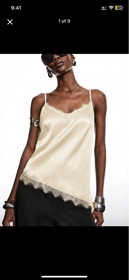 Cream Lace Trim Satin Cami Top (Category: Sleeveless) located in Valenzuela. Submitted by grasyahh (Listing ID 1460866342, Image 1). Description: - Cream satin cami top - Delicate lace trim - Adjustable spaghetti straps - Flattering asymmetrical hemline - Super soft and silky material - Perfect for layering or wearing solo - Dress up or down for any occasion.