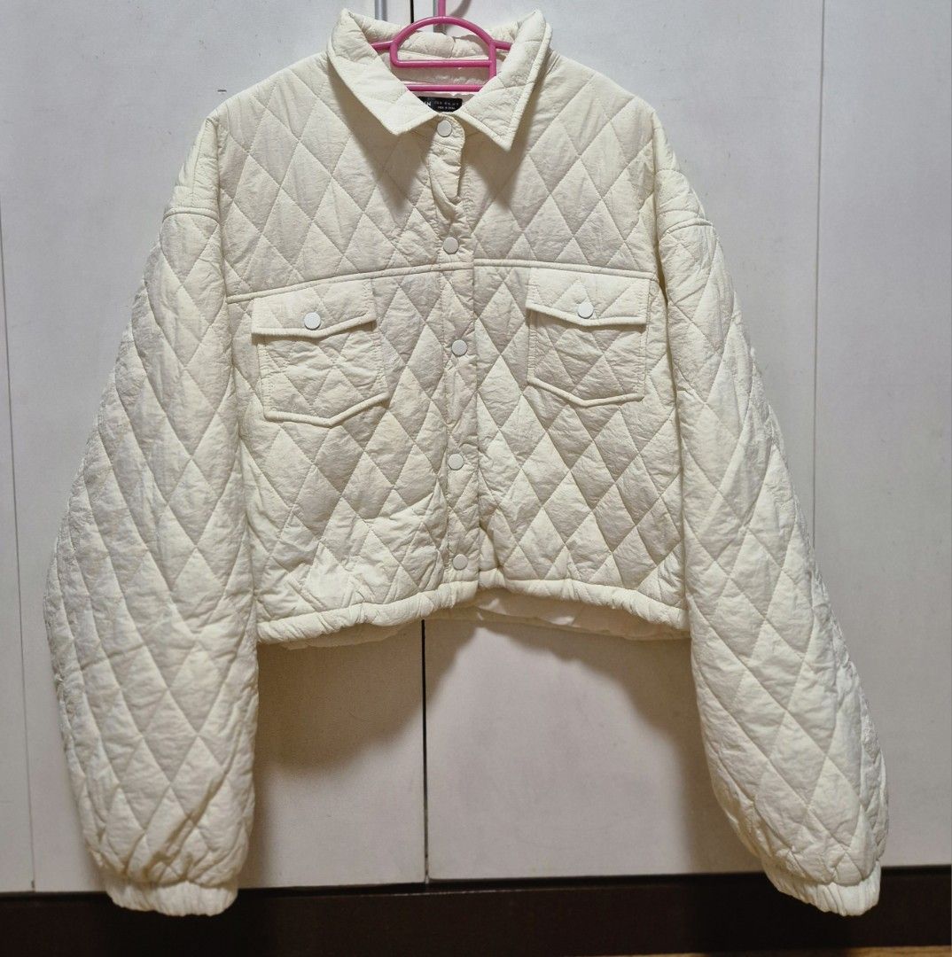 Plus Size Cropped Jacket Shein (Category: Coats, Jackets and Outerwear) located in Manila. Submitted by sorayabarr50152 (Listing ID 1460847221, Image 1). Description: - Cream colored quilted jacket - Features a collar and button-up front - Two chest pockets with button closures - Cropped length - Elasticated cuffs and hem - Cozy and stylish design, ideal for layering.
