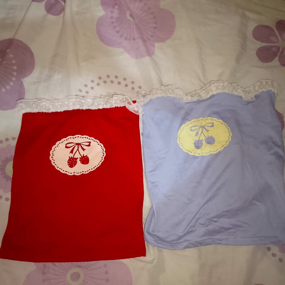 Cute Cherry Tube Tops (Red & Blue) (Category: Others Tops) located in Manila. Submitted by checksumitemshere (Listing ID 1460759689, Image 1). Description: - Set of 2 cute tube tops: 1 red, 1 light purple. - Adorable cherry graphic on both. - Delicate lace trim for a sweet touch. - Stretchy material for a comfortable, flexible fit. - Perfect for casual outfits or layering. RED- Never used or try to fit. Violet - used once. .