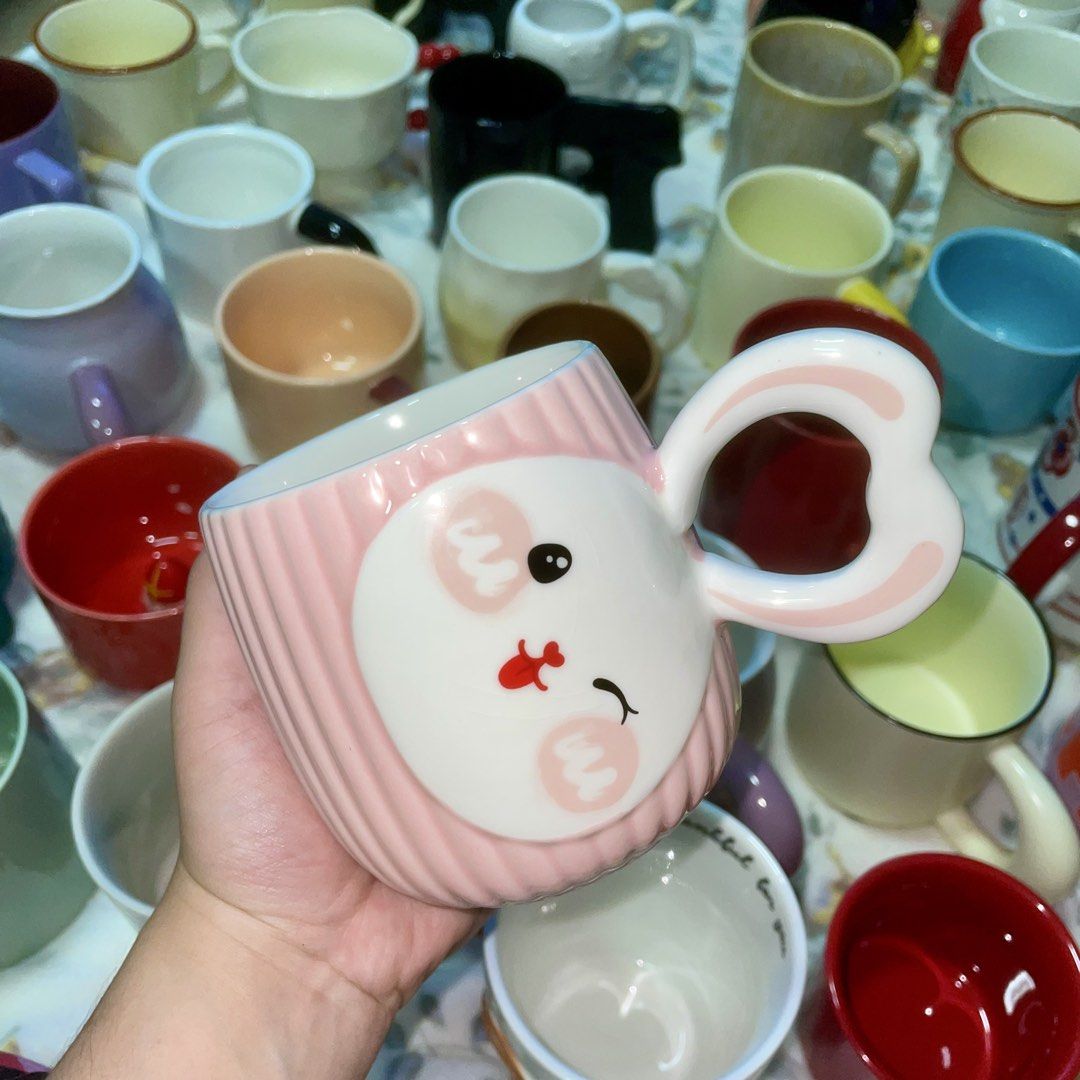 Cute Pink Bunny Ceramic Mug with Heart Handle (Category: Coffee & Tea Tableware) located in Valenzuela. Submitted by baekhyunie_pau (Listing ID 1460805358, Image 1). Description: Cute pink bunny mug with heart handle. Perfect for coffee or tea. More mugs available!.