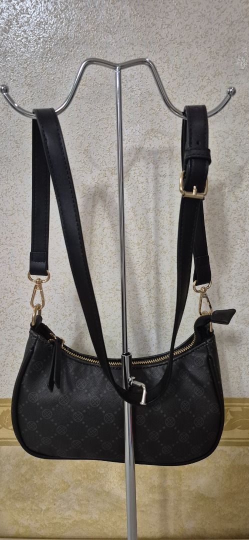 D19-450 Anna Field Monogram Sling Bag (Category: Luxury Bags & Wallets) located in Valenzuela. Submitted by dailyhappyfinds (Listing ID 1460773469, Image 3). Description: BRAND: Anna Field -Brand new without tag -Sling bag -Slightly sticky strap -Please check last photo for details *Mall pullout/ factory pullout, please manage your expectations.
