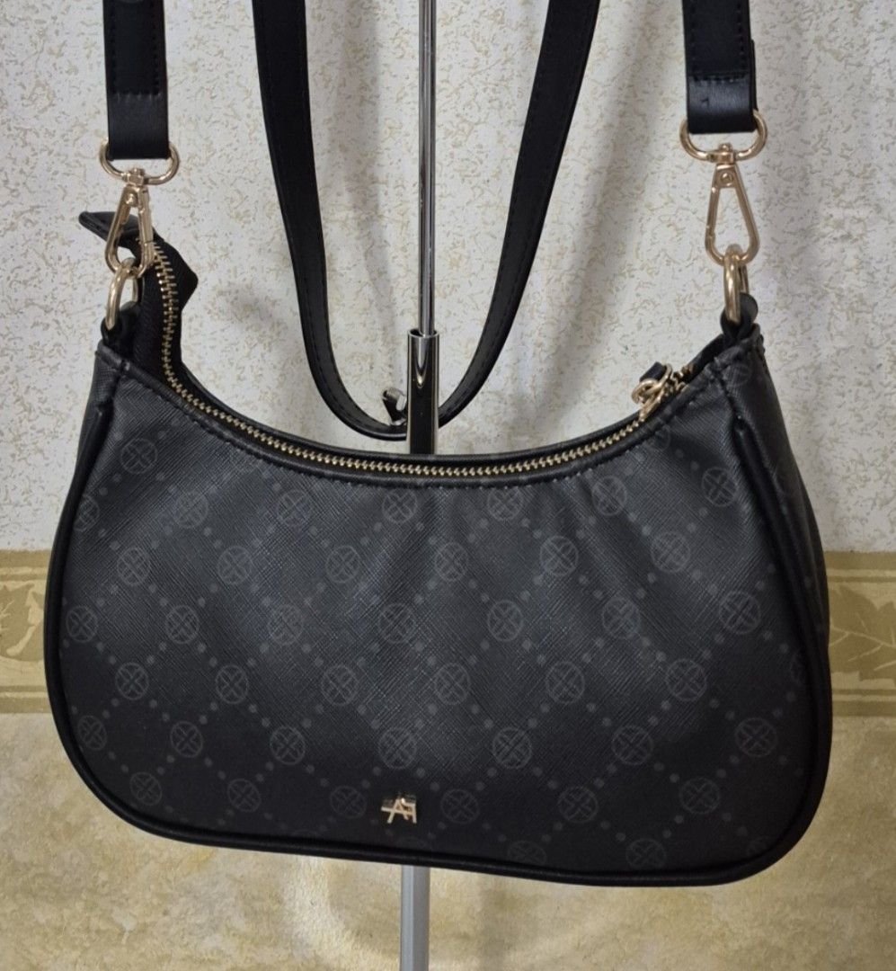 D19-450 Anna Field Monogram Sling Bag (Category: Luxury Bags & Wallets) located in Valenzuela. Submitted by dailyhappyfinds (Listing ID 1460773469, Image 1). Description: BRAND: Anna Field -Brand new without tag -Sling bag -Slightly sticky strap -Please check last photo for details *Mall pullout/ factory pullout, please manage your expectations.