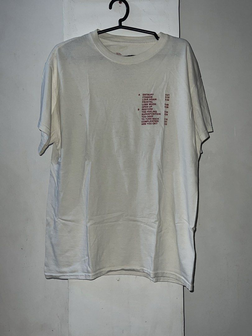 Daniel Caesar Case Study 01 T-Shirt (Category: Tshirts & Polo Shirts ) located in Manila. Submitted by asa68984 (Listing ID 1460881436, Image 2). Description: - White t-shirt from Daniel Caesar's Case Study 01 album. - Front print: Tracklist. - Back print: Album release date and runtime. - Ideal for Daniel Caesar fans. - Showcases album details..