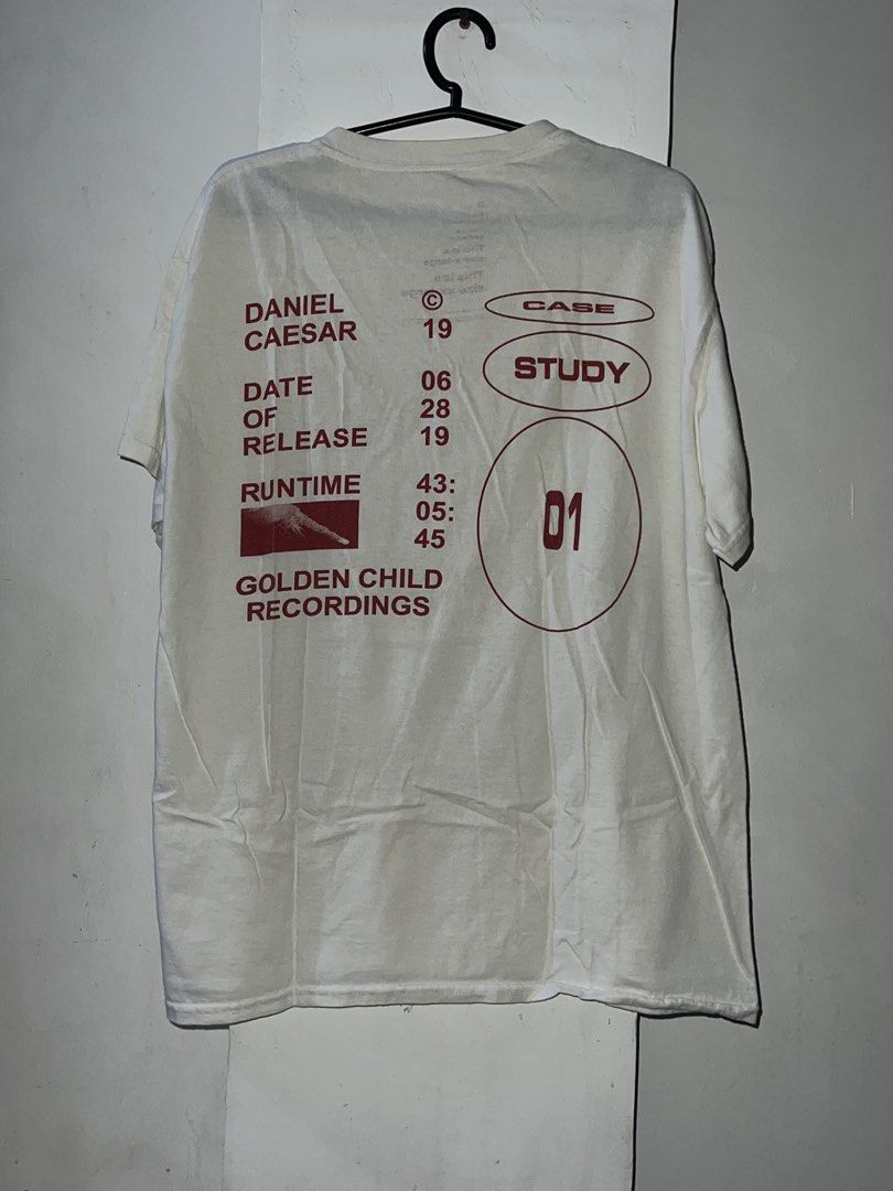 Daniel Caesar Case Study 01 T-Shirt (Category: Tshirts & Polo Shirts ) located in Manila. Submitted by asa68984 (Listing ID 1460881436, Image 1). Description: - White t-shirt from Daniel Caesar's Case Study 01 album. - Front print: Tracklist. - Back print: Album release date and runtime. - Ideal for Daniel Caesar fans. - Showcases album details..