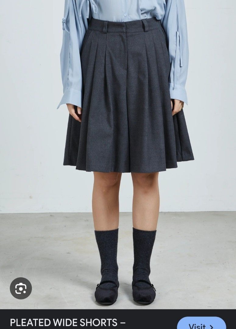 Dark Grey Pleated Wide Shorts Culottes (Category: Shorts) located in Manila. Submitted by PrinceDani.Clothing (Listing ID 1460754142, Image 1). Description: gray pleated shorts Size 27in width 20.5in length excellent condition .