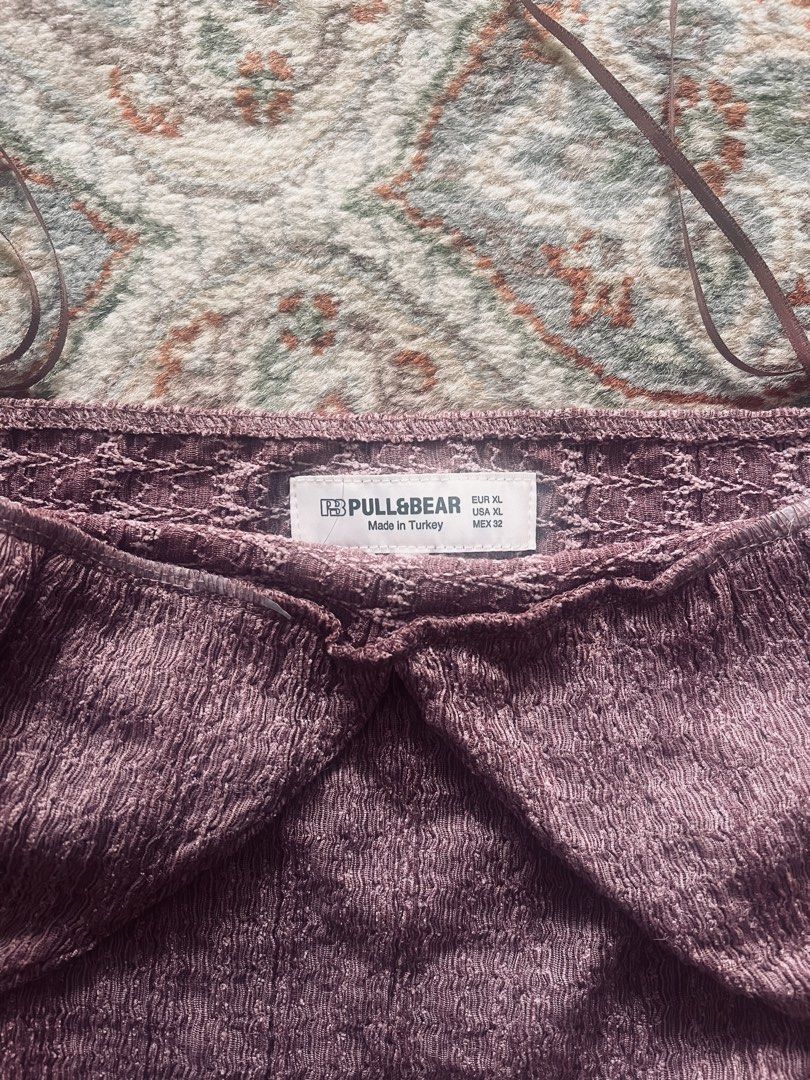 Dark raspberry tank top Pull&bear (Category: Others Tops) located in Makati City. Submitted by sweetcereza (Listing ID 1460724755, Image 2). Description: Pull&bear halter top - fits L to XL - tieable straps - Flattering dark raspberry color Bought in: Pull&Bear Condition: never worn .