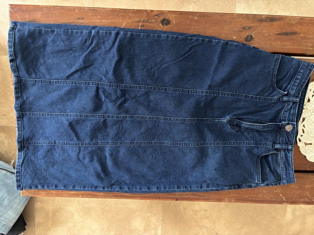 FORME Dark Wash Maxi Denim Skirt (Category: Skirts) located in Calamba. Submitted by s3r3s4 (Listing ID 1460745722, Image 2). Description: Waist - 27 inches Hips - 33.6 inches Length - 29.5 inches - Long dark wash denim skirt - Features vertical seams down the front - Classic five-pocket styling - Button and zip closure - Versatile for casual wear.