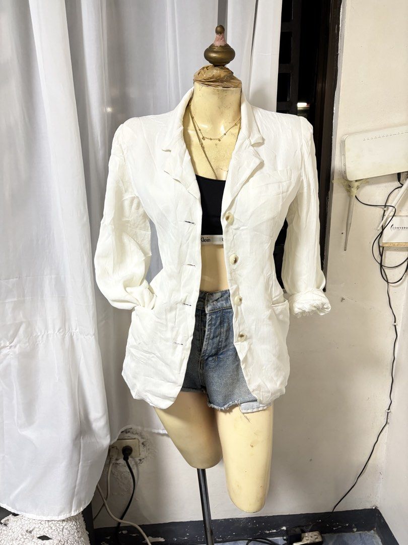 David & Petite's White Linen Blend Blazer Size M (Category: Coats, Jackets and Outerwear) located in General Trias. Submitted by crissy9053136 (Listing ID 1460867425, Image 1). Description: - White blazer by David & Petite's - Comfortable linen blend fabric - Classic button front closure - Two functional front pockets - Stylish cuffed sleeves - Versatile: pairs perfectly with shorts or jeans.